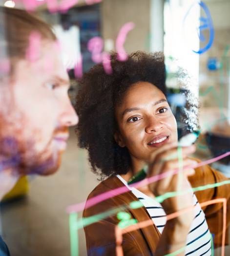 Businesspeople discussing together in conference room meeting at office