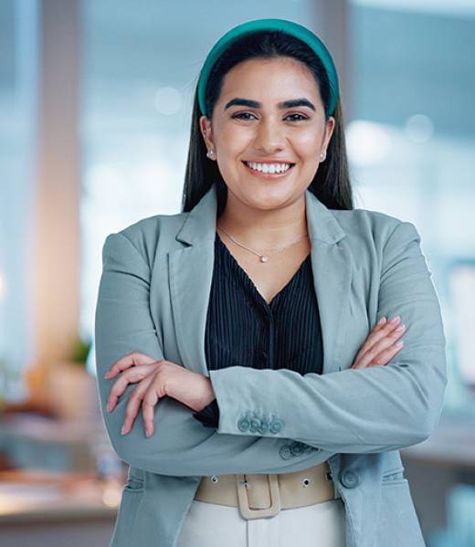 Face, arms crossed and happy business woman in office, corporate company or workplace. Portrait, co.